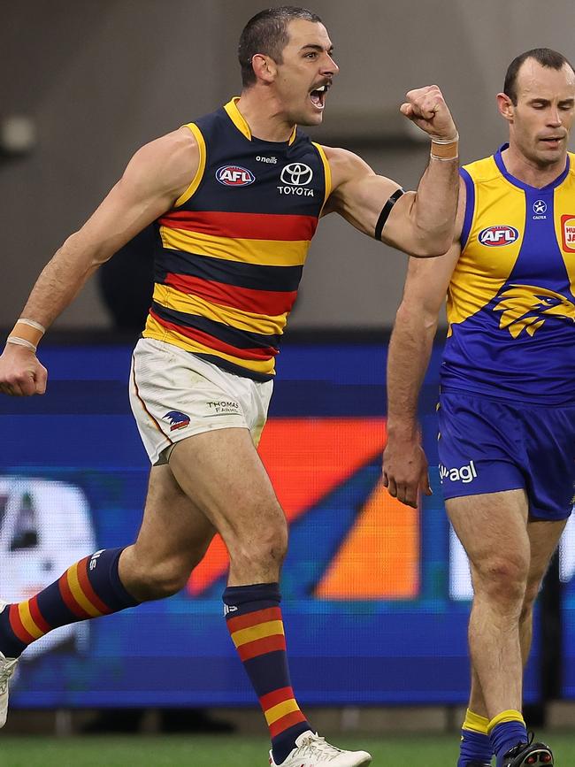 Taylor Walker celebrates one of his nine goals against the Eagles in Perth. Picture: Paul Kane/Getty Images.