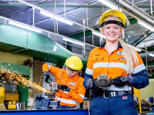 BHP Mitsubishi Alliance apprentice Sophie Chicholm, 22, front. Picture: Contributed