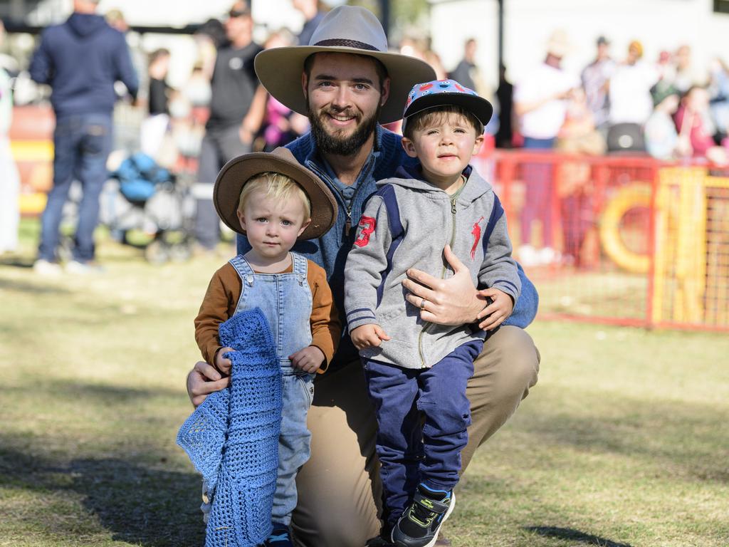 Anthony Vadalma with sons (left) Ezekiel and Mathias Vadalma at Sadie's Day Out, a special community event to celebrate the life of five-year-old crash victim Sadie, held at Cambooya State School, Saturday, June 7, 2025. Picture: Kevin Farmer