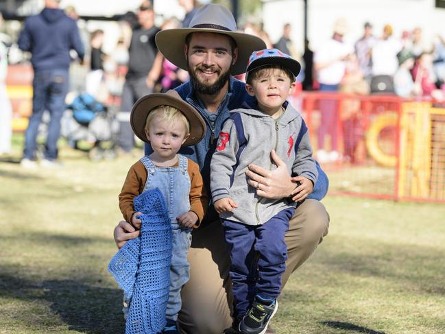 Anthony Vadalma with sons (left) Ezekiel and Mathias Vadalma at Sadie's Day Out, a special community event to celebrate the life of five-year-old crash victim Sadie, held at Cambooya State School, Saturday, June 7, 2025. Picture: Kevin Farmer