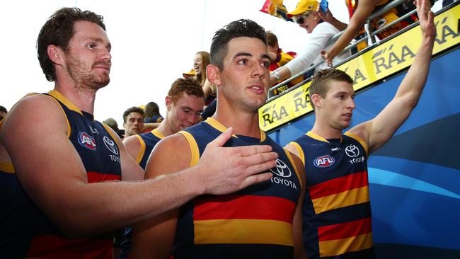 AFL - Adelaide Crows v North Melbourne Kangaroos at Adelaide Oval. Well Done Tex - Patrick Dangerfield congratulates Taylor Walker on his game and the win along with Josh Jenkins. Photo Sarah Reed