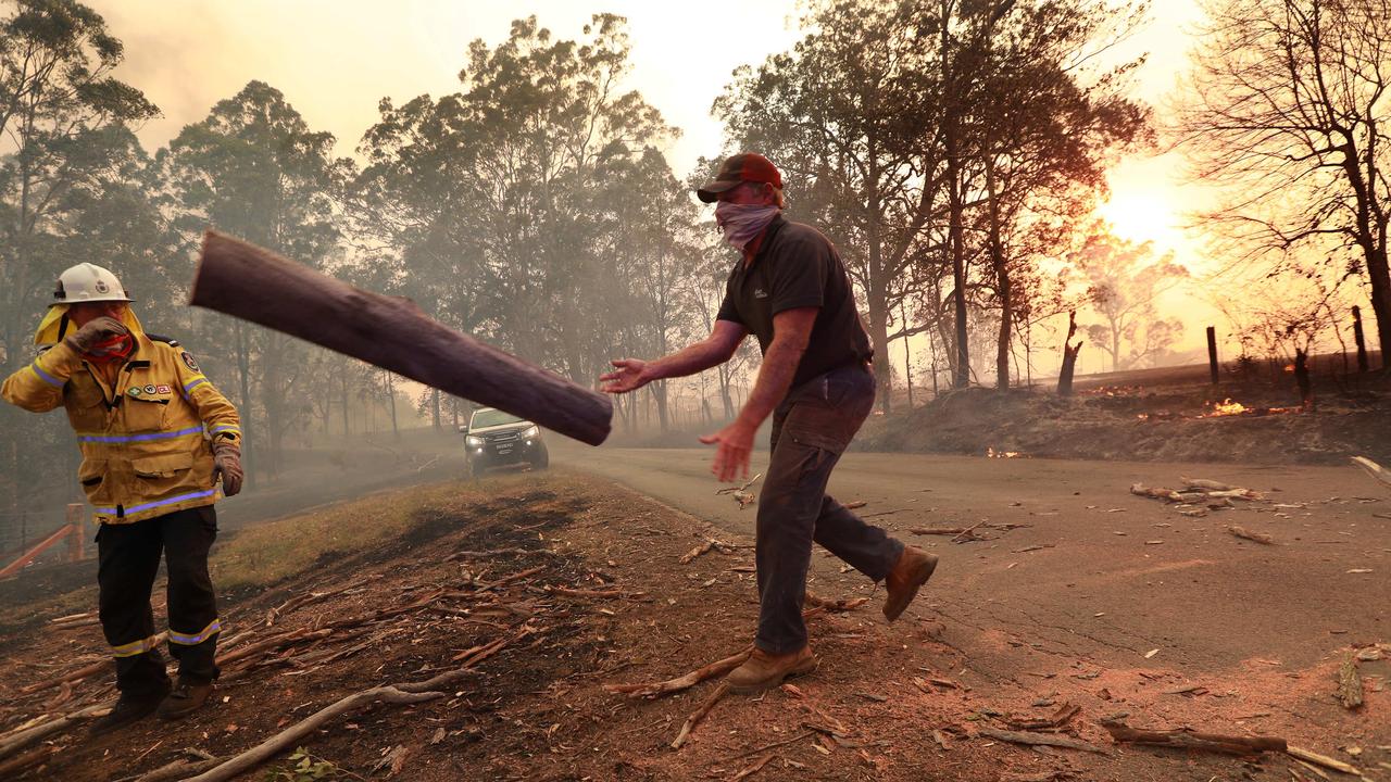 Locals assisted the RFS who battled into the night. Picture: Gary Ramage