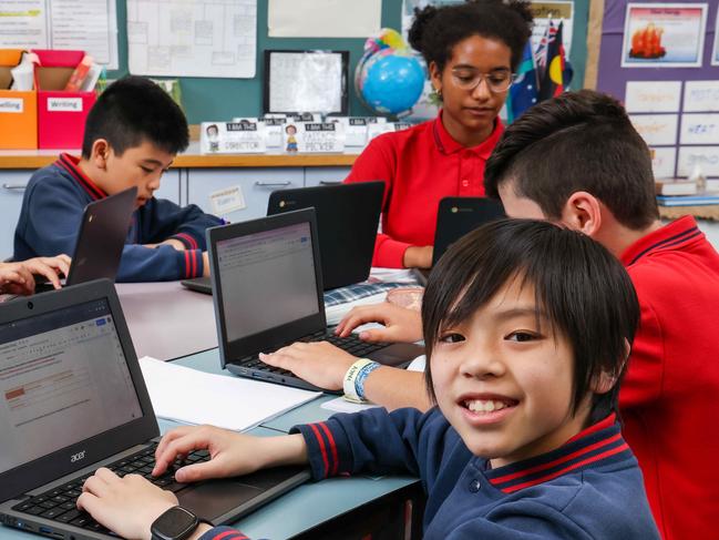 St Leo's primary school in Altona North has posted growth in NAPLAN scores across multiple learning areas in recent years. Grade 5 students Mia , Shaun , Gabriela , Ryan and Thien-An at work in the classroom. Picture : Ian Currie