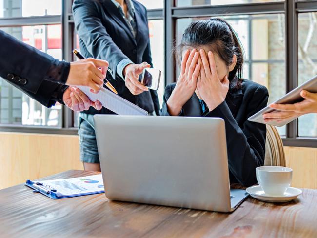 RendezView. Female office worker with too many tasks to take at the same time. (Pic: iStock)