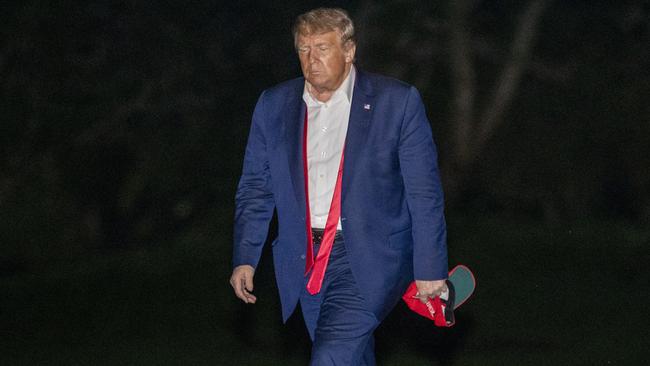 Donald Trump returns from the Tulsa campaign rally looking as triumphant as a cleaned out gambler. Picture: AP.