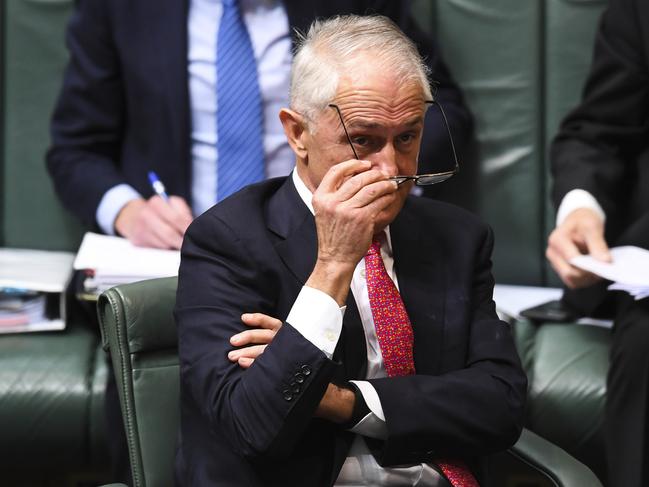 Australian Prime Minister Malcolm Turnbull reacts during House of Representatives Question Time at Parliament House in Canberra, Tuesday, August 21, 2018.  (AAP Image/Lukas Coch) NO ARCHIVING