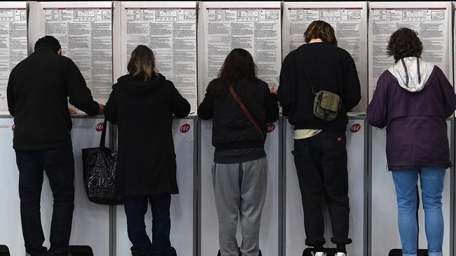 Taking a trip to the polling booth may be more dangerous than we thought — watch out for those paper cuts. Picture: Julian Smith, AAP Image.