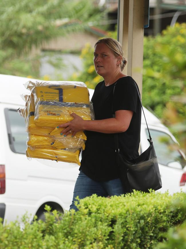 Locals deliver much needed supplies to the Wisemans Ferry Bowling Club. Picture: John Grainger