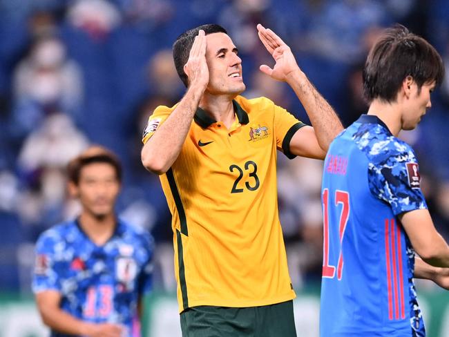 Australia's midfielder Tomas Rogic (2nd-L) reacts after missing an attempt during the 2022 Qatar World Cup Asian Qualifiers group B football match between Japan and Australia, at Saitama Stadium in Saitama, on October 12, 2021. (Photo by CHARLY TRIBALLEAU / AFP)