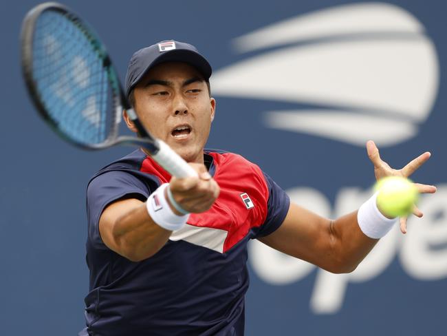 NEW YORK, NEW YORK - AUGUST 28: Rinky Hijikata of Australia returns a shot against Pavel Kotov during their Men's Singles First Round match on Day One of the 2023 US Open at the USTA Billie Jean King National Tennis Center on August 28, 2023 in the Flushing neighborhood of the Queens borough of New York City. (Photo by Sarah Stier/Getty Images)