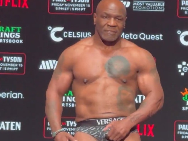 Mike Tyson grabs his crotch at the weigh in for his fight against Jake Paul. Picture: X