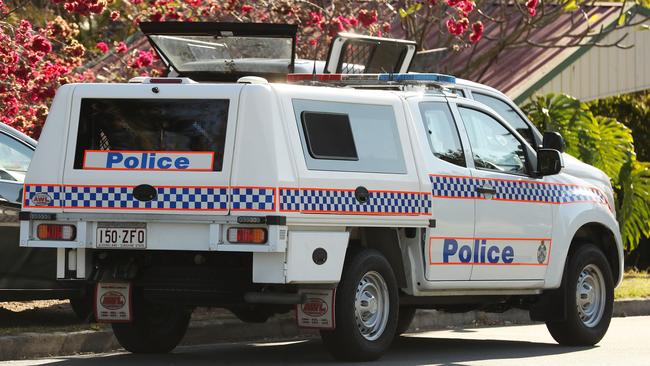 Detection dogs were brought in as part of a police raid of an Arana Hills home last Thursday. Picture: Liam Kidston