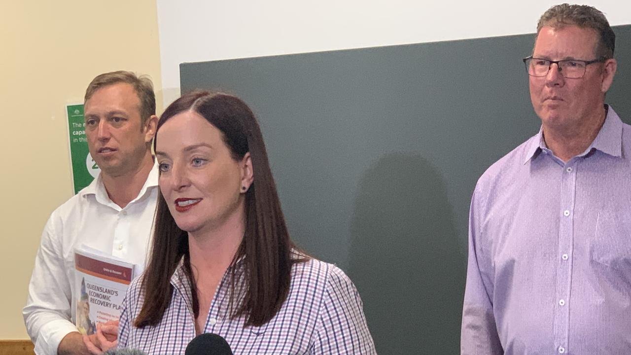 Labor's Deputy Premier and Minister for Health Steven Miles with Labor's candidates for Rockhampton, Barry O'Rourke and Keppel, Brittany Lauga.