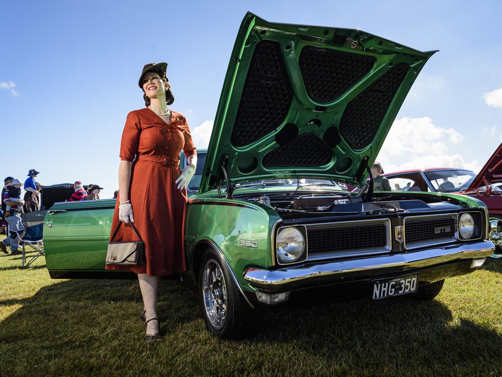 Regina St Johnwood with a 1970 Holden Monaro HG owned by her dad on show at the David Hack Classic. Regina went on to win the fashion parade, Sunday, May 18, 2025. Picture: Kevin Farmer