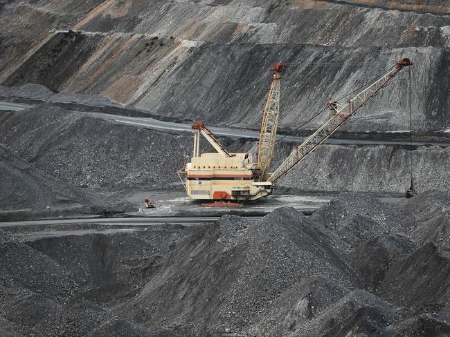 Action in the pit at Bulga Open Cut Coal Mine south of Singleton. Picture by Peter Lorimer.