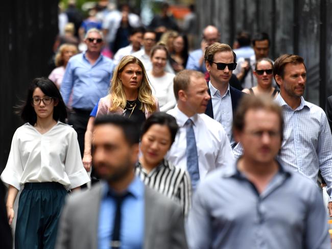 Office workers are seen at lunch break at Martin Place in Sydney, Wednesday, December 12, 2018. (AAP Image/Mick Tsikas) NO ARCHIVING