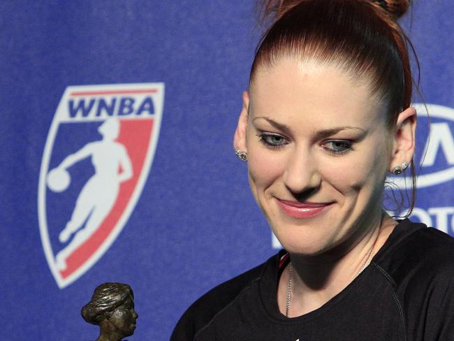 Seattle Storm's Lauren Jackson smiles as she is handed the 2010 WNBA Most Valuable Player trophy. Picture: AP Photo/Elaine Thompson