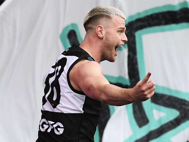 ADELAIDE, AUSTRALIA - AUGUST 08:Peter Ladhams of Port Adelaide celebrates a goal  during the round 11 AFL match between the Port Adelaide Power and the Richmond Tigers at Adelaide Oval on August 08, 2020 in Adelaide, Australia. (Photo by Mark Brake/Getty Images)