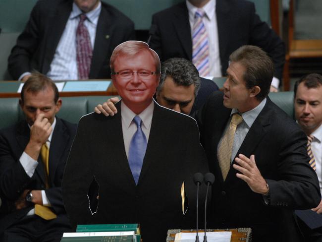 So flimsy! National MP Luke Hartsuyker holding a cardboard cutout of then Prime Minister Kevin Rudd in the House of Representatives.