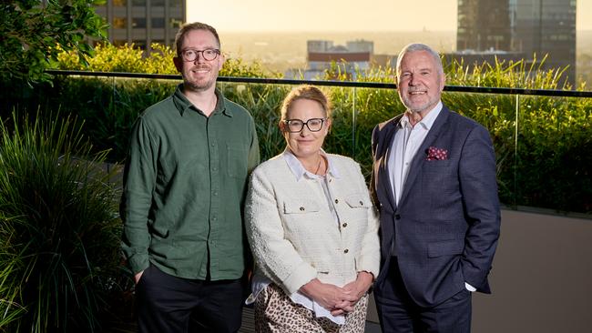 Department for Housing and Urban Development director Brett Steiner and deputy chief executive Sally Smith with State Planning Commission chair Craig Holden. Picture: Sweet Lime Photo