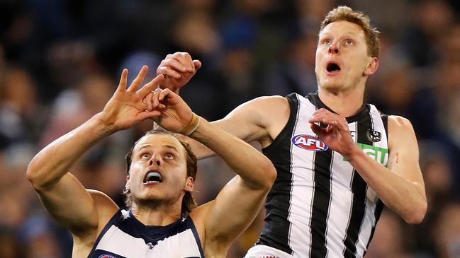 Jake Kolodjashnij of the Cats and Will Hoskin-Elliott of the Magpies in action during the colour clash final. Picture: Michael Willson/AFL Photos via Getty Images