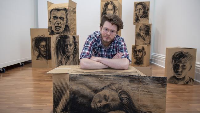 Albert Park artist Daniel Coulson with some of his work from the Aesthetic Distortions exhibition. Picture: Andy Brownbill