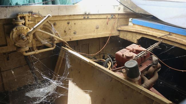 An old boast gathers dust and spider webs at Richie Britten's shed. Picture: Peter Carruthers