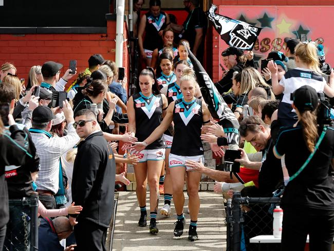 Captain Erin Phillips leads the Power out on to the field for their first AFLW game. Picture: Getty Images