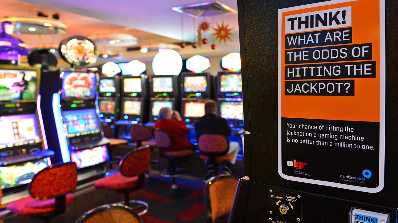 The separate Victorian royal commission heard disturbing evidence about Crown customers playing pokies for hours - even days - at a time. Picture: William West/AFP