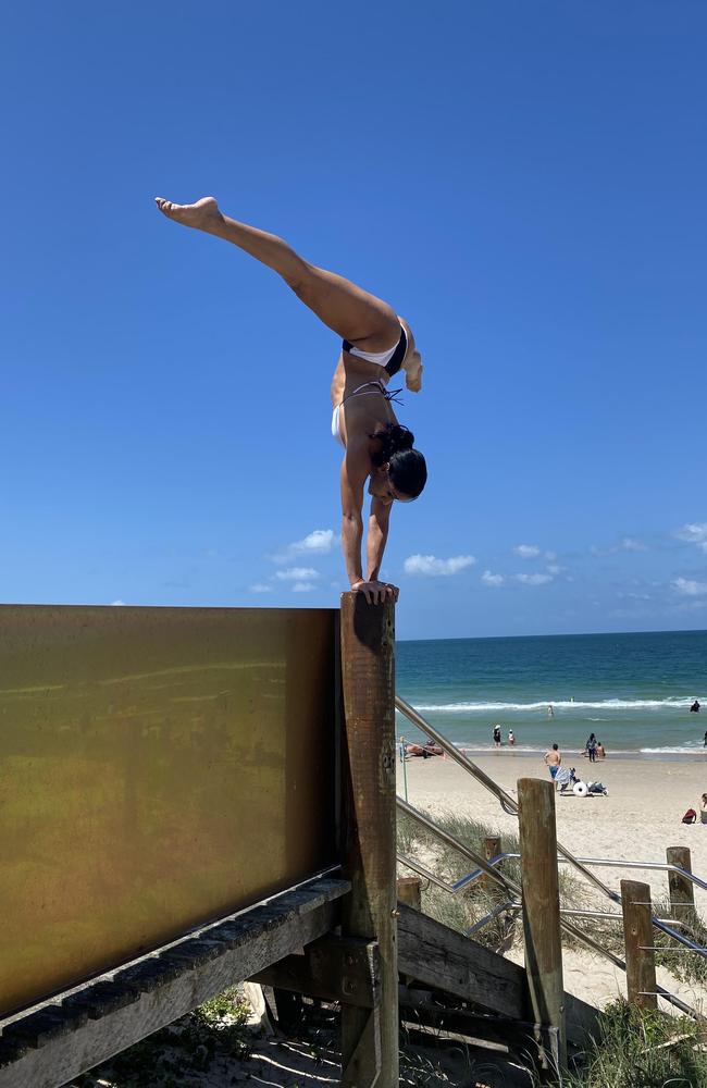 Violeta loves a challenge and a handstand.