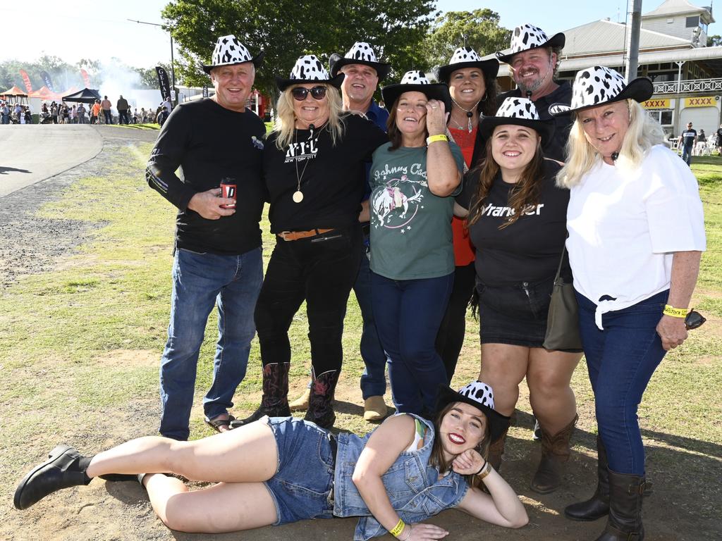 (back from left) Wayne Eichmann, Sharon Lally and Allan Drescher. (fron from left) Wayne Drescher, Bernie Drescher, Leanne Eichmann, Kelsi Chiles, Karen Horewycz and Sheridan McDougall on ground at Meatstock, Toowoomba Showgrounds. Friday, April 8, 2022. Picture: Nev Madsen.