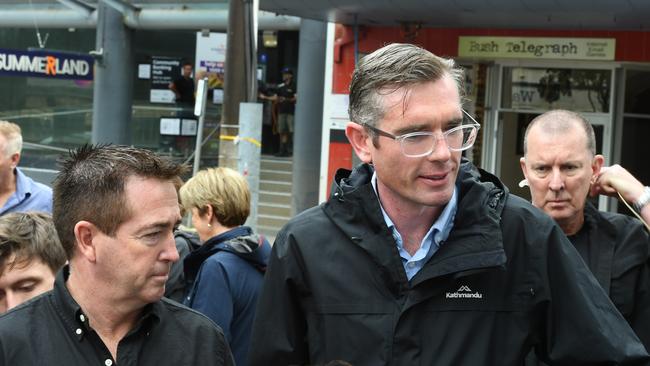 Premier Dominic Perrottet assessing flood damage in the Lismore CBD.