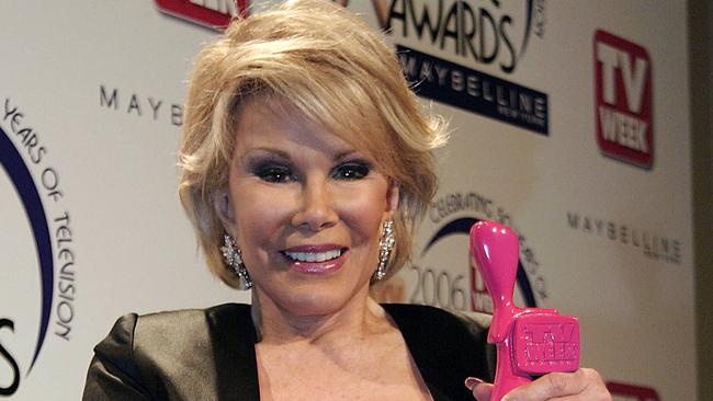 Joan Rivers with her pink Logie.