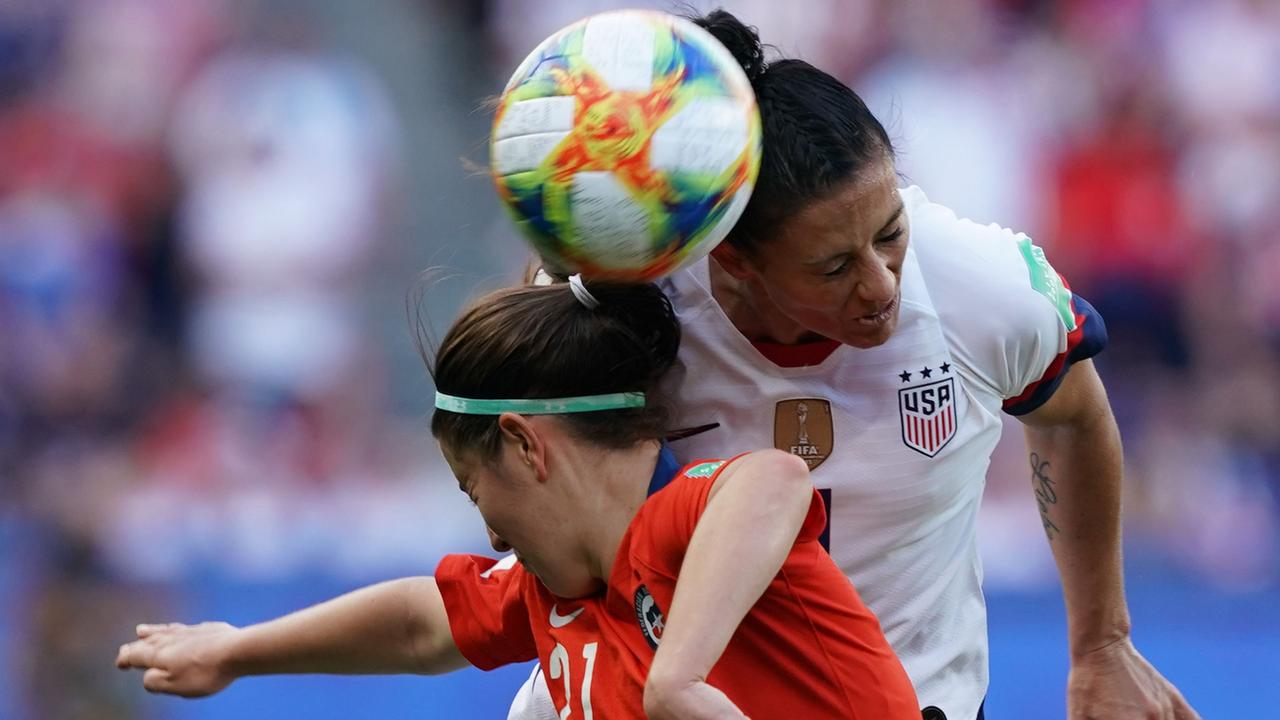 Ali Krieger stands in solidarity with her teammate