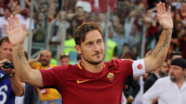 Francesco Totti greets the Roma fans after his last match for the club.