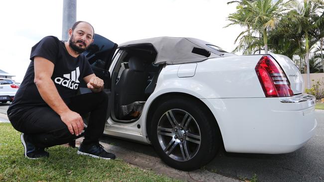 Sorrento resident Albert Doumit surveys the damage to his cars in Balmoral Ave. Picture Glenn Hampson