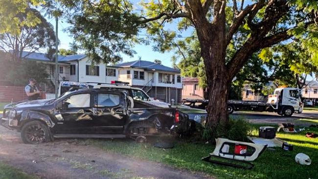 The scene on Prince St Grafton where a car collided with a tree following a police pursuit. Photo courtesy TNT Towing.