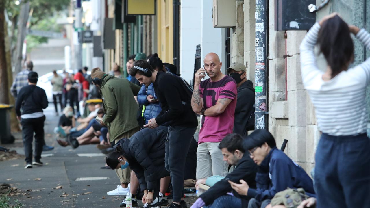 How will the RBA rate cuts and buying up government bonds help everyday Aussies from the Centrelink queue? Picture: Rohan Kelly