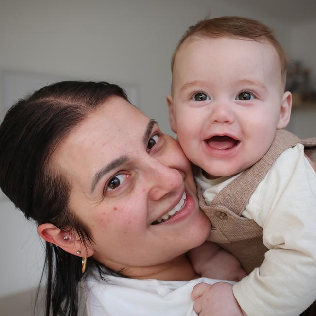 Holding a toy near the lens can keep baby interested. Picture: David Caird