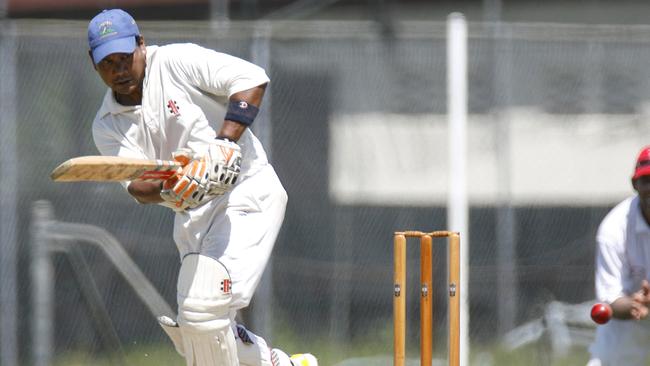 Bevan Ahkee from United hits the ball in the A grade Cricket match between United and Innisfail at Griffiths Park. 03/03/2007