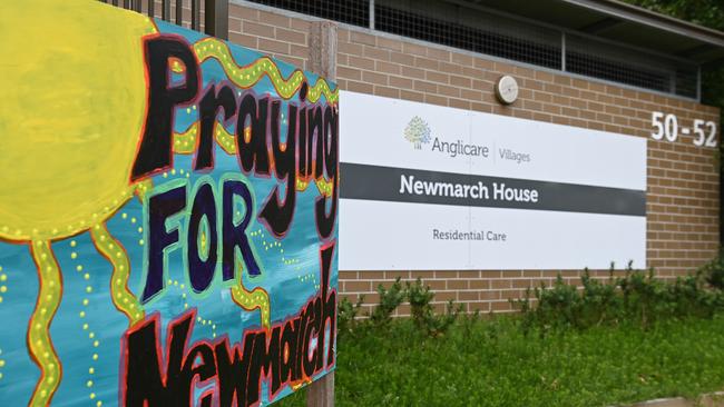 Signs and flowers outside Sydnmey’s Newmarch House. Picture: AAP