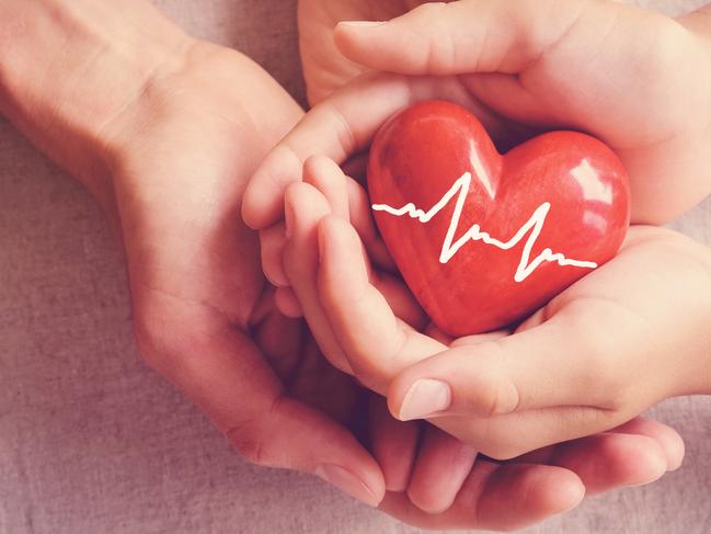 Health insurance, child and woman holding a heart. Picture: iStock.