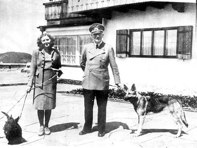 Adolf Hitler with girlfriend Eva Braun and their dogs at Berchtesgaden.