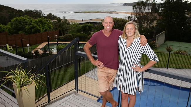 Rugby league start Daryl with his daughter and Olympic water polo player Bronte Halligan.