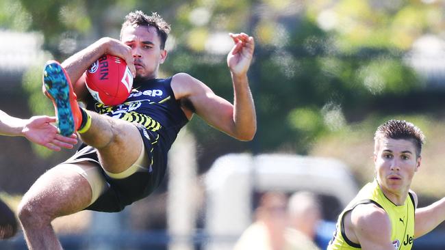 Sydney Stack pulls down a high mark at Richmond training. Picture: Michael Dodge. 