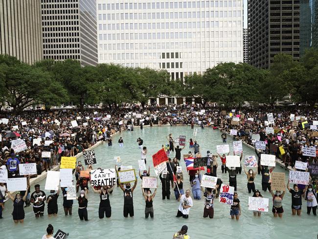 People rally to protest the death of George Floyd in Houston. Picture: AP