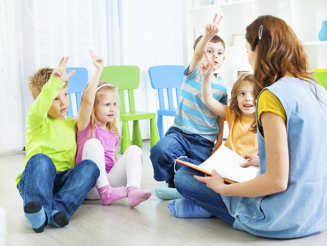 Generic photo of a childcare worker and children in a daycare centre