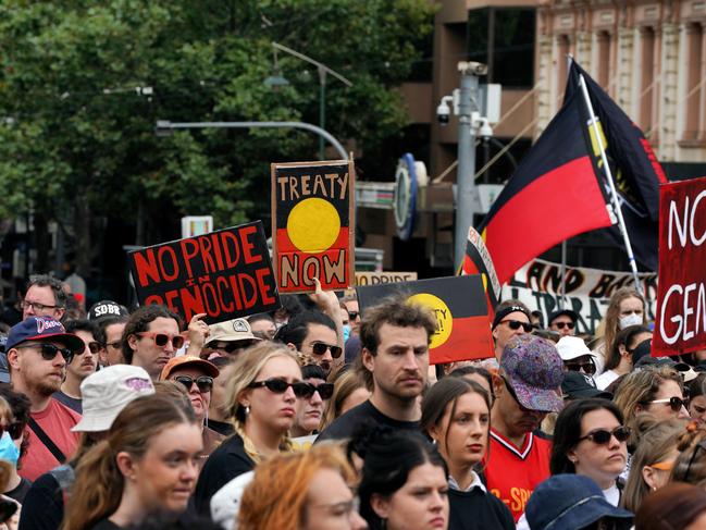 Invasion Day protesters gathered outside State Parliament at Spring St, Melbourne Picture: Luis Enrique Ascui