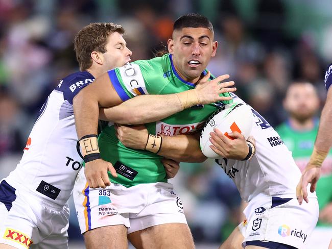 CANBERRA, AUSTRALIA - JUNE 14: Emre Guler of the Raiders is tackled during the round 15 NRL match between Canberra Raiders and North Queensland Cowboys at GIO Stadium, on June 14, 2024, in Canberra, Australia. (Photo by Mark Nolan/Getty Images)