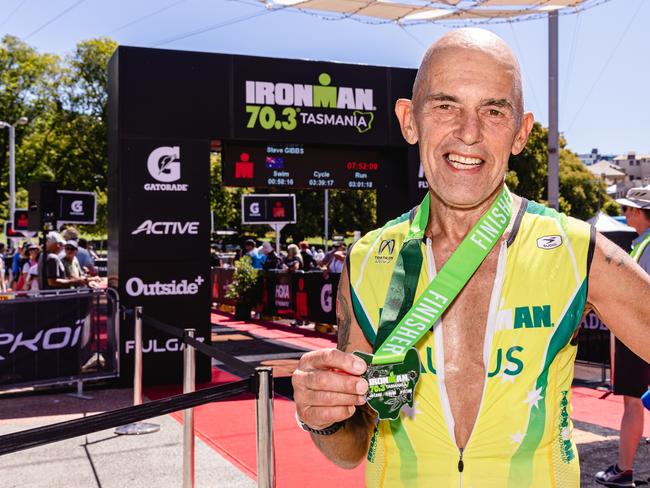 Bomber Hutchinson at the finish of the Ironman 70.3 Tasmania in Hobart. Picture: Linda Higginson